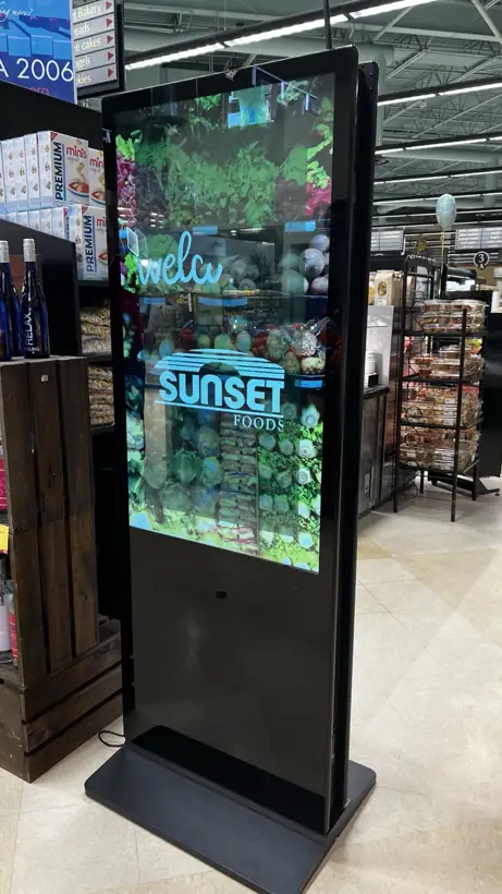 Sunset Foods digital display showing a welcome message