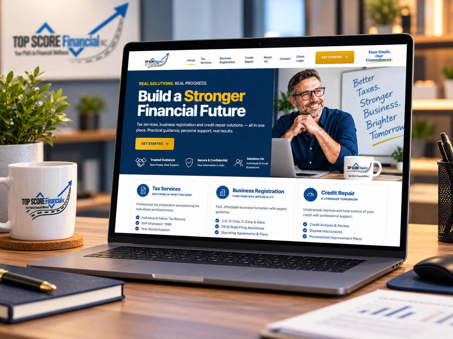 Top Score Financial website displayed on a laptop in an office setting